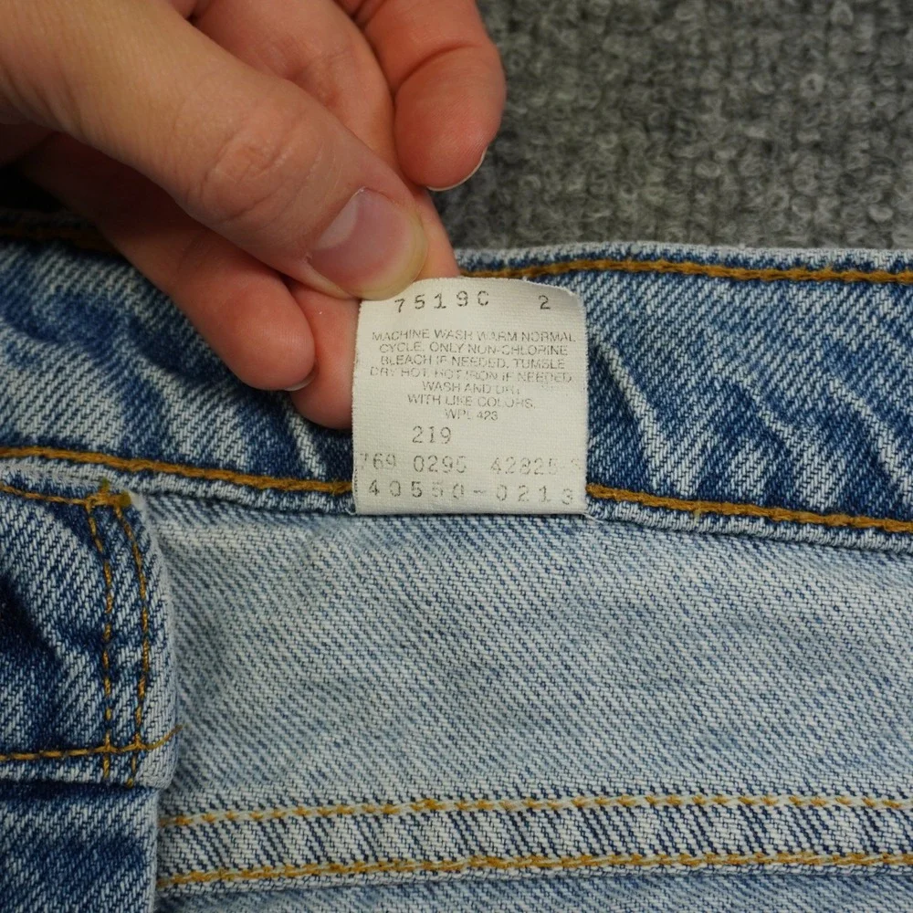 Vintage Levis 550 Relaxed Fit Tapered Mens Light Wash Orange Tab Jeans 34x32 90s
